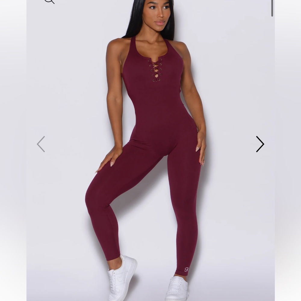 Red bombshell lace up bodysuit